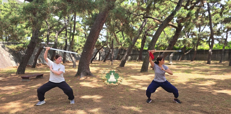 German student practicing Kung Fu Sword at Japan Osaka Kung Fu School in Osaka Japan